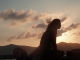 「夕日をバックに」のサムネイル画像